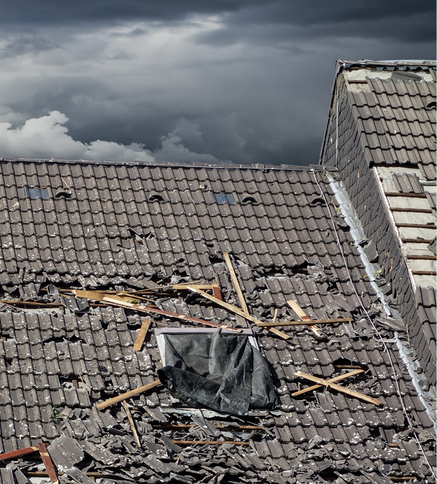 Broken roof tiles after storm damage